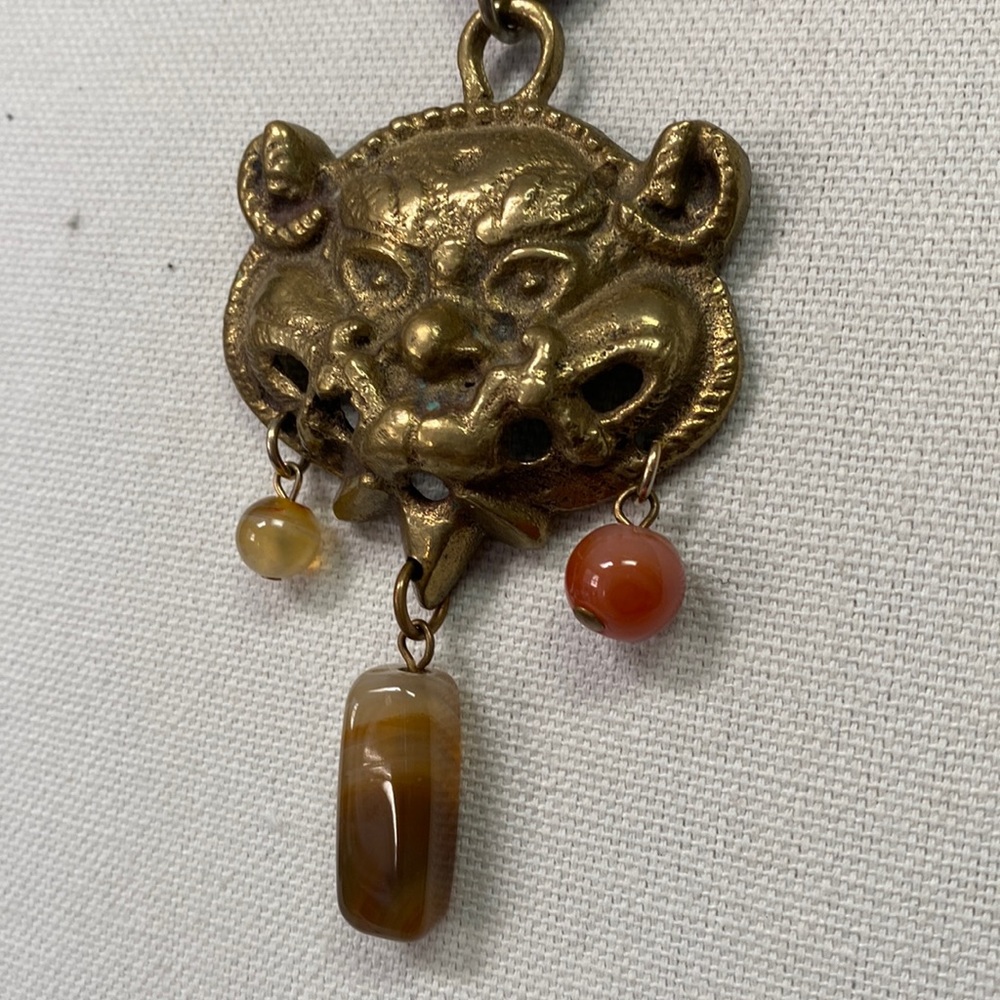 Very unique artisan necklace dangling stones